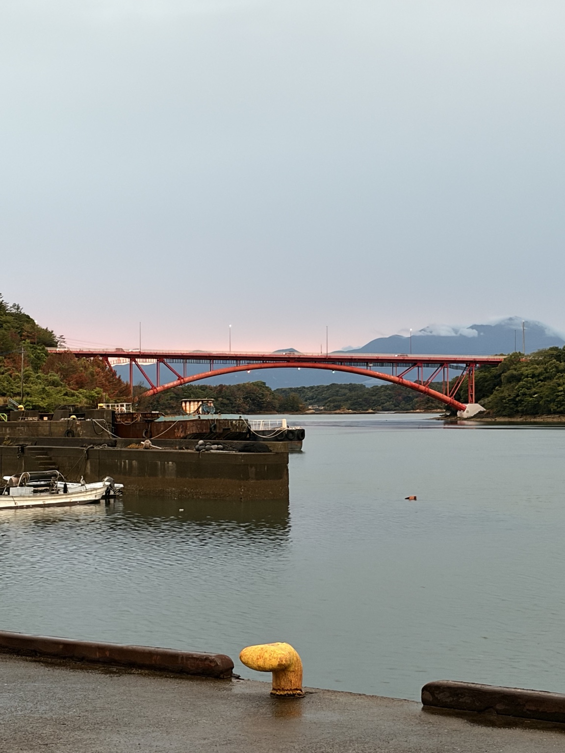 NOVIPPON photograph of an arched bridge across the water